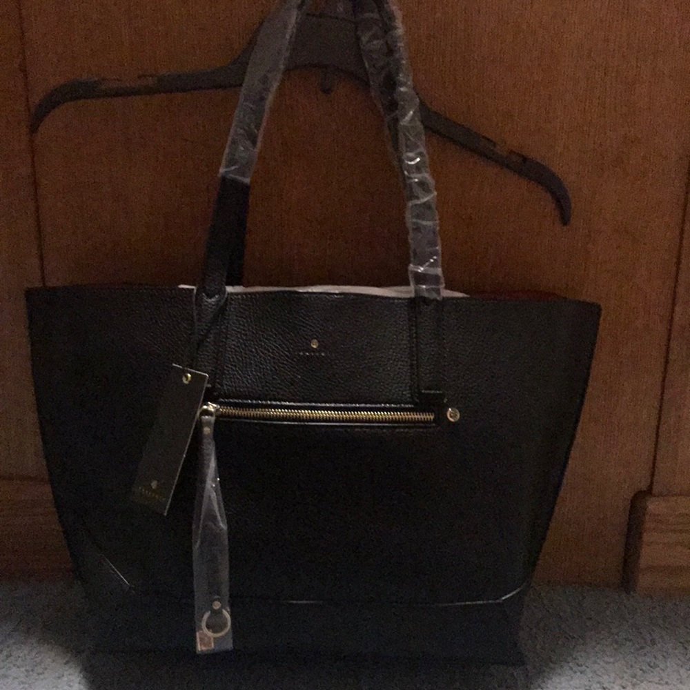 Black travanti purse new in wrap